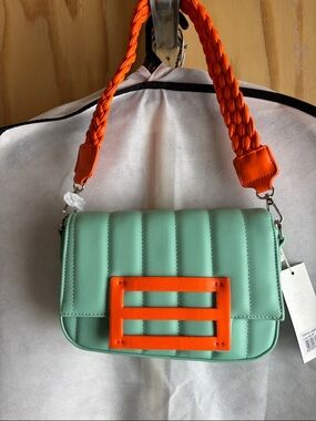 Mint Green Quilted Shoulder Bag with Bright Orange Accents